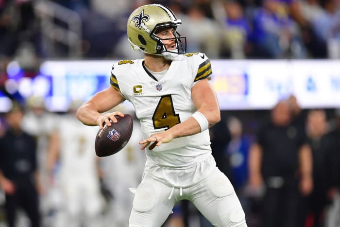 New Orleans Saints quarterback Derek Carr (4) throws against the Los Angeles Rams. Mandatory Credit: Gary A. Vasquez-USA TODAY Sports